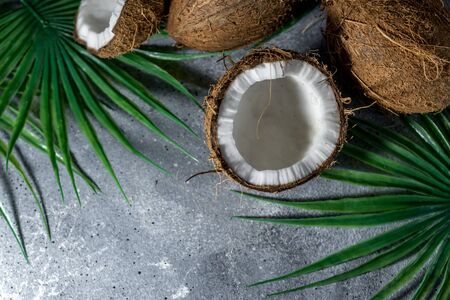 ripe chopped coconut on a gray stone background.の写真素材