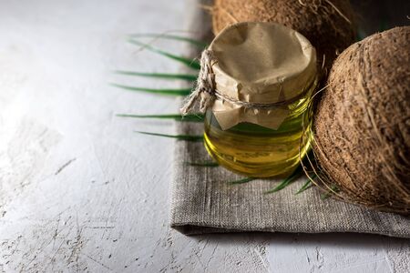 coconut and bottle of coconut palm oil.の写真素材