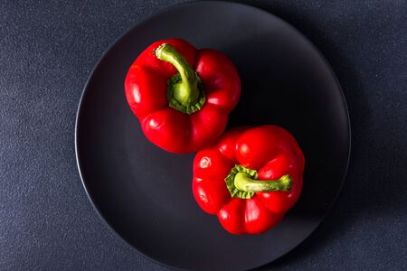 healthy red sweet on a dark background with place for textの写真素材