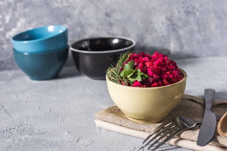 Food background. Christmas menu Beetroot salad - vinaigrette in a bowl, top view. Vegan cuisine. Diet menuの写真素材