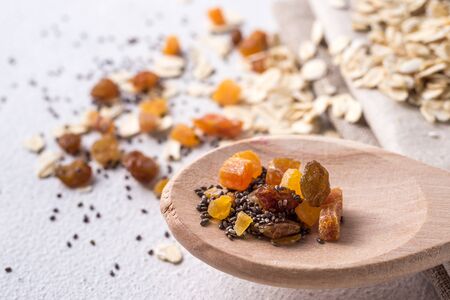 Bowl with useful oatmeal on a light background. The concept of cooking oatmeal. healthy food. dietの写真素材