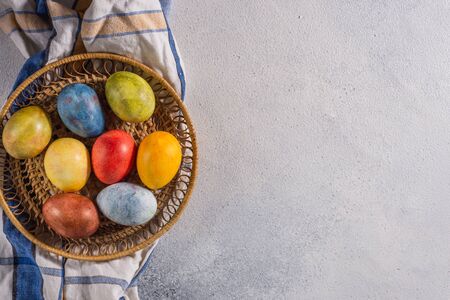 Multi-colored bright easter eggs. Easter eggs on a light background symbol. Christ is risen copyspace close-upの写真素材