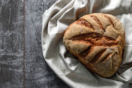 Fresh homemade buckwheat bread. healthy sourdough bread. background with place for text.の写真素材