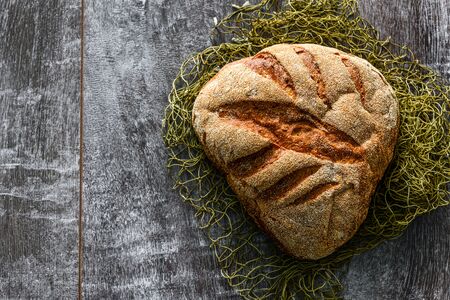 Fresh homemade buckwheat bread. healthy sourdough bread. background with place for text.の写真素材