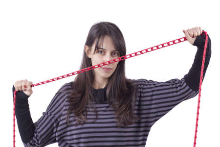 Girl's holding a chain isolated on whiteの写真素材