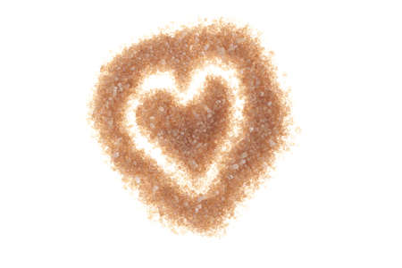 Brown sugar heart isolated on whiteの写真素材