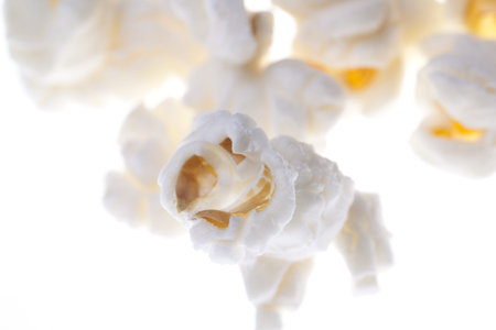 Popcorn macro isolated on whiteの写真素材