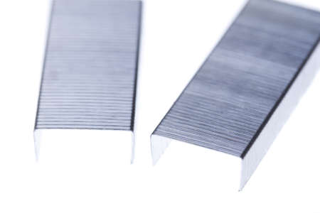 Metalic staples isolated on whiteの写真素材