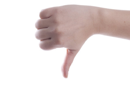 Woman hand showing thumb down