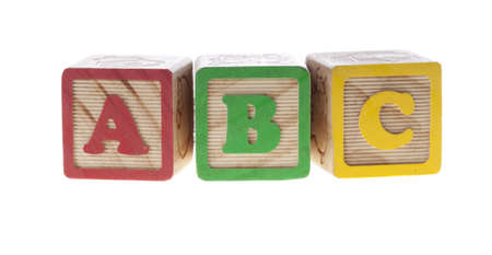 ABC with letter wooden cubes isolated on whiteの写真素材