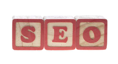 SEO written with letter wooden cubes isolatedの写真素材