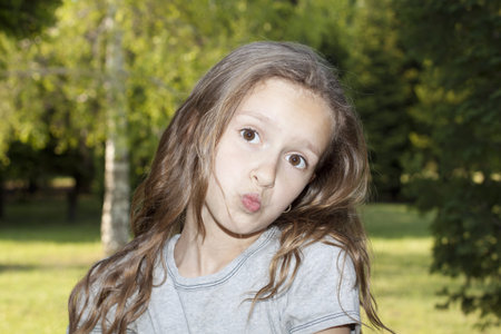 Happy little girl in a park