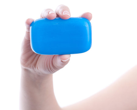 Woman holding a blue soap. isolated