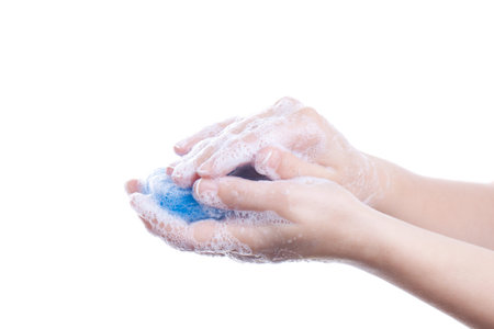 Woman washing her hands isolated.