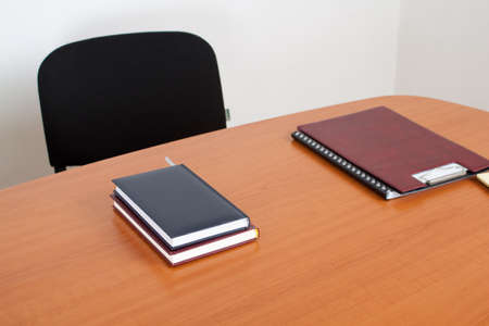 Desk with documents and books. Meeting room interiror.の写真素材