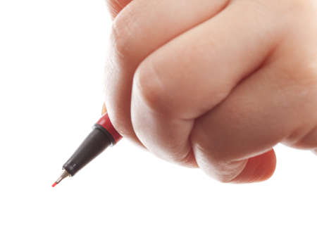 Woman hand's holding a pen isolated on whiteの写真素材
