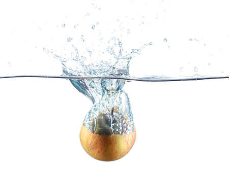 Apple water splash. High speed photography.の写真素材
