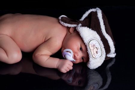 Newborn baby boy with funny hat