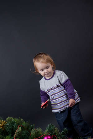 Little girl with cristmas toysの写真素材