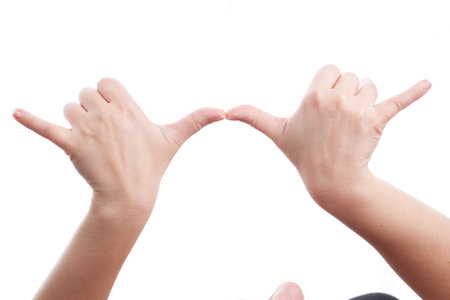 Hand showing a distance isolated on whiteの写真素材