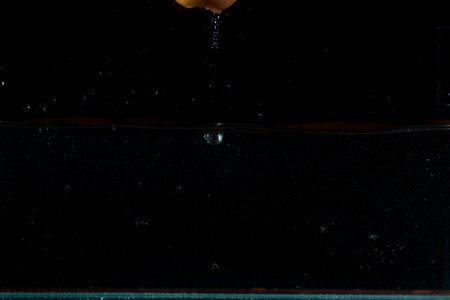 Apple water splash. High speed photography.の写真素材