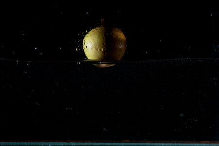 Apple water splash. High speed photography.の写真素材