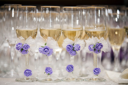 lot of glasses with champagne during on the wedding party table 