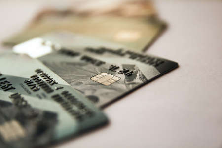 different credit cards, close-up view, background with copy space. selective focus.の写真素材