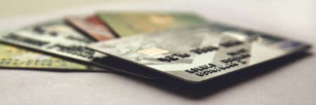 stack of credit cards, close up view with selective focus. panorama.の写真素材