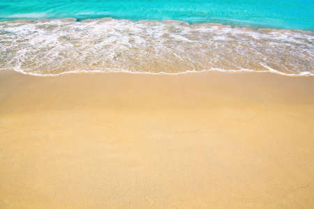 Beautiful sea wave on sand beach with copy space for design postcard and calendar.の写真素材