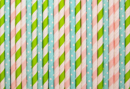 Background with multicolored paper straws close-up.の写真素材