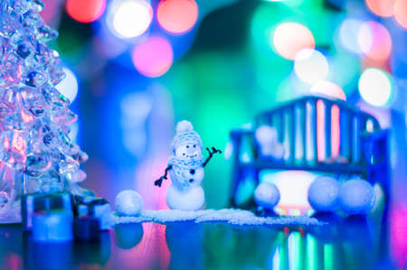New Year, photo design mysterious bright night snowman bench Christmas tree gifts copy space. Mockup for postcard. Hand Maid, miniatureの写真素材