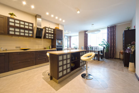 Elegant kitchen with dining area in a modern style の写真素材
