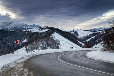 Beautiful mountain road in winterの写真素材