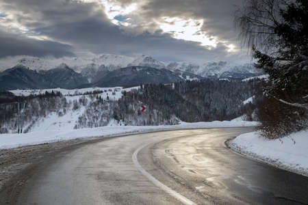 Beautiful mountain road in winterの写真素材