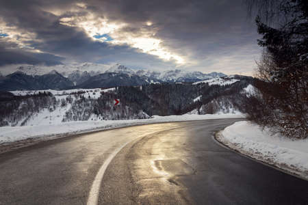 Beautiful mountain road in winterの写真素材