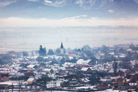 Beautiful winter landscape of the transylvanian villageの写真素材