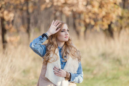 Autumn portrait of a beautiful young womanの写真素材