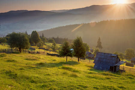 Summer sunrise landscape in Bucovina, Romaniaの写真素材