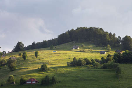 Aerial foggy landscape in Transylvania, at sunrise. Summer sunrise in the Transylvanian villageの写真素材