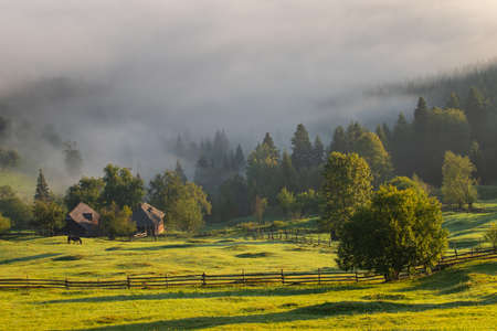 Early fall landscape in the beautiful Romanian villagesの写真素材