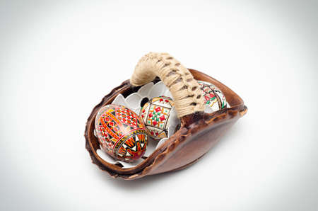 Traditional romanian orthodox easter eggs in a basketの写真素材