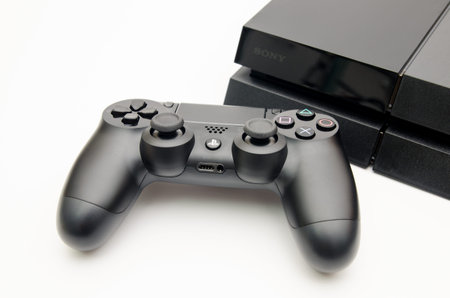 CLUJ-NAPOCA, ROMANIA - 25 FEBRUARY: Illustrative editorial image of Sony Playstation 4 console with...