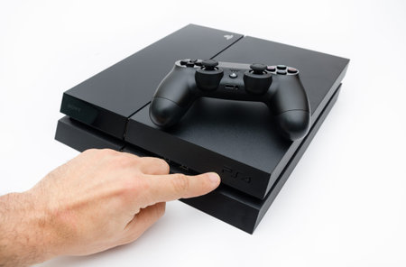 CLUJ-NAPOCA, ROMANIA - 25 FEBRUARY: Illustrative editorial image of Sony Playstation 4 console with...