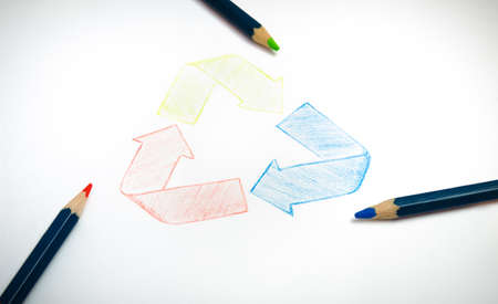 Recycle sign hand drawing with green red and blue pencilsの写真素材