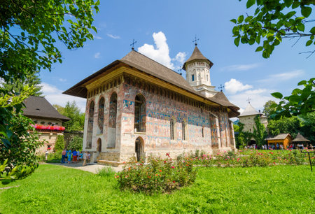HUMORULUI, ROMANIA - 8 AUGUST 2014: Old traditional Orthodox Humorului Monastery Church in Moldavia...