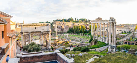 ROME, ITALY - 1 December 2015: Ancient roman ruins on the site of the Temple of Saturn and Arco di Settiemo Severoのeditorial素材