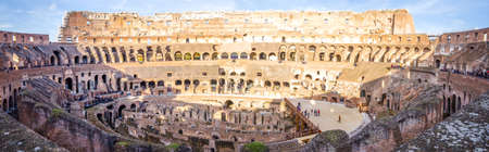 ROME, ITALY - 29 November 2015: Panoramic wide view of the interior of the Colosseum in Rome, a wonderful ancient historic site with lots of visitorsのeditorial素材