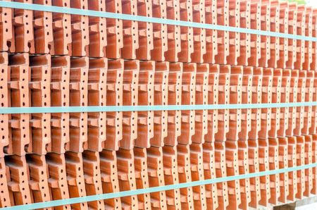 Ceramic roof tiles in a stack on a construction site