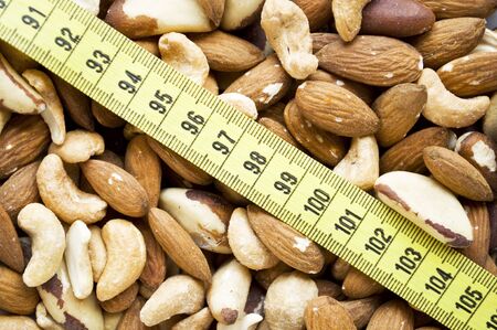 Nuts and measure tapeの写真素材